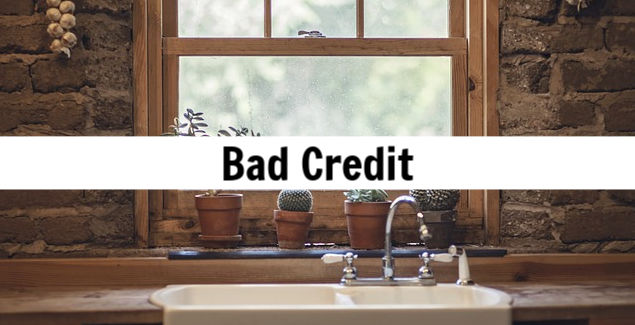 Bad credit text overlay on a rustic kitchen window scene with potted plants, symbolizing the challenges faced by borrowers seeking portfolio loans.