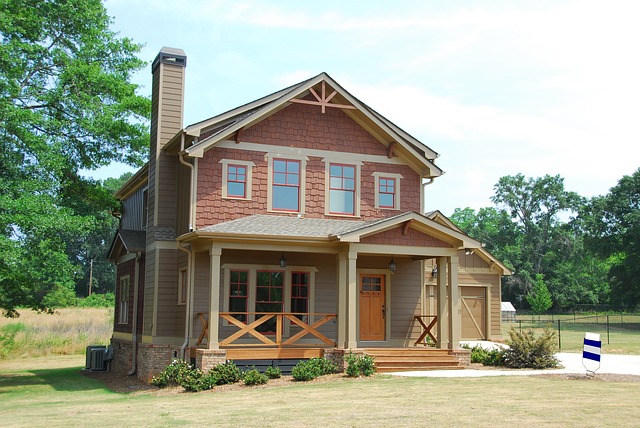 Newly constructed suburban home with a welcoming front porch, suitable for families exploring USDA Rural Development Loan options.